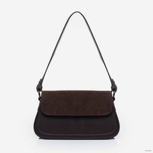 Сумка українського бренду ТМ  "Lucherino" стане хорошим придбанням не на один рік.  Невелика жіноча сумочка виготовлена з високоякісного шкірзамінника та якісної надійної фурнітури в кольорі - нікель. Одне відділення з однією кишенею на застібці.